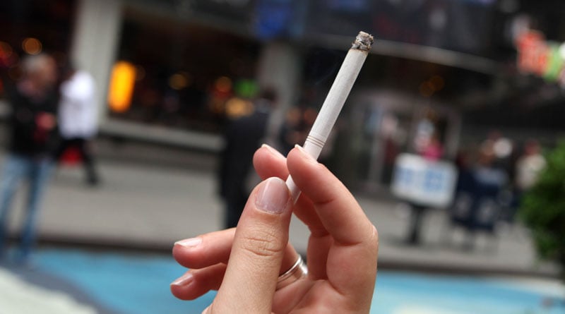 Ads failed, but cash crunch cuts cigarette sales