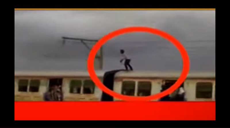 Youth performs extremely dangerous stunt atop Mumbai local train