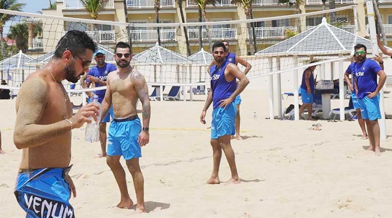 Virat Kohli flaunts chiseled body as he plays volleyball on the beach