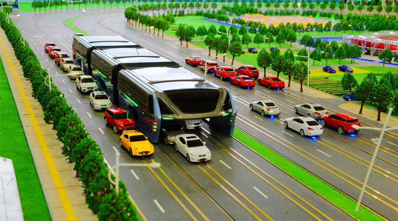 Prime minister Narendra Modi has asked the road transport ministry to get maximum details world's first Transit Elevated Bus.