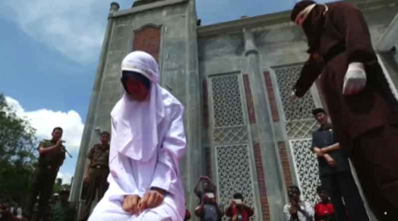 Indonesia: Woman whipped on street before baying crowd for dating