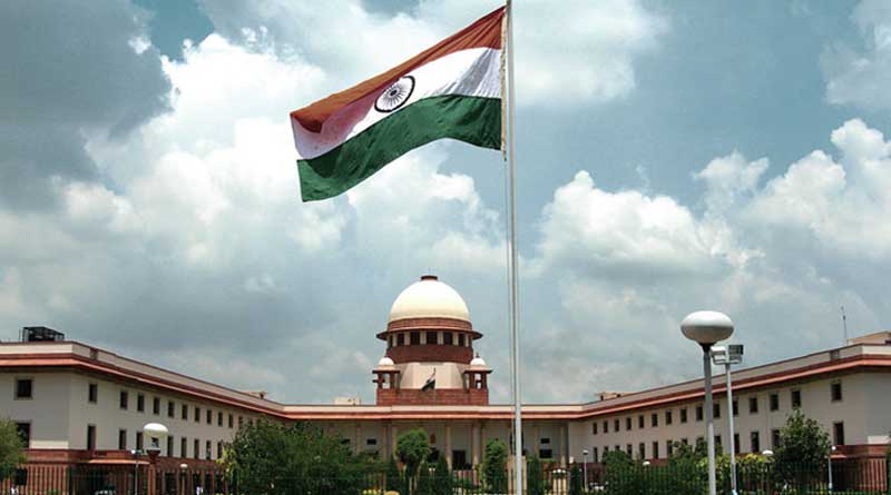 No need to stand up for National Anthem as it's part of Film: Supreme Court