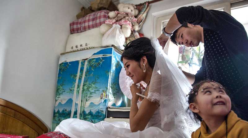 Chinese newlywed 'allows guests to molest her during the ceremony to raise money for her honeymoon