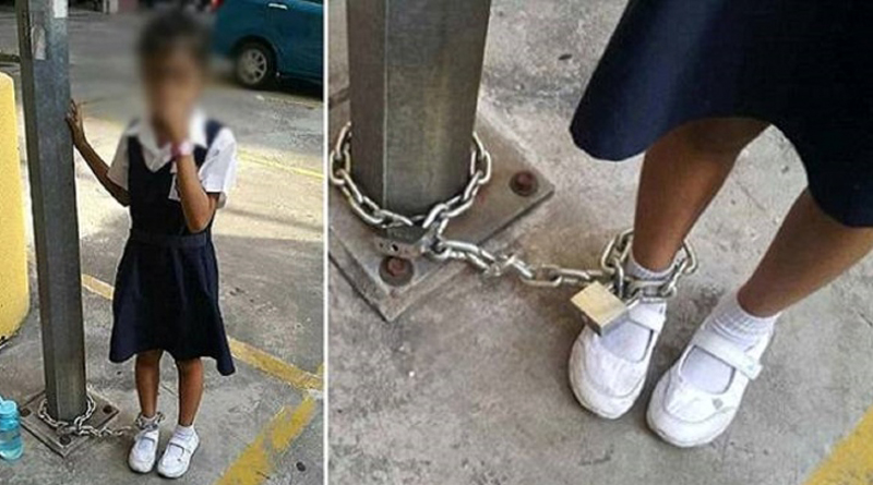 A woman shackled her 8-year-old to a lamp post because she gave her school a miss