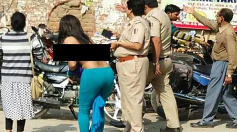 Woman Strips in Delhi being Tired of statnding in ATM Queue