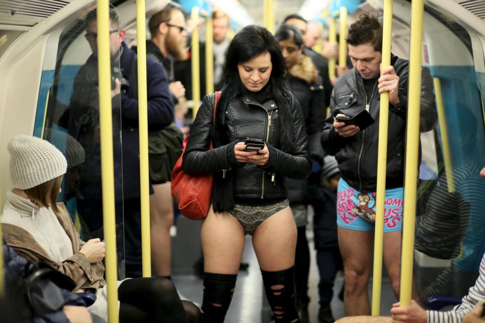 Participants in the annual No Trousers On The Tube Day ride the London Underground in London, Britain January 10, 2016.   REUTERS/Paul Hackett