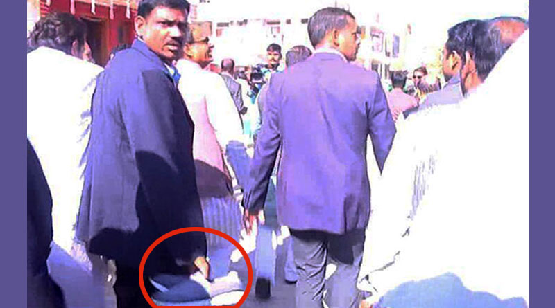 Police officer seen carrying Shivraj Singh Chouhan's shoe