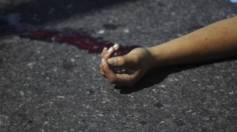 Husband kills wife, stayed with dead body for long period