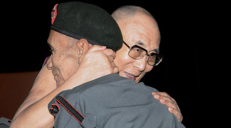 58 years later nostalgic Dalai Lama hugs 'old guard'