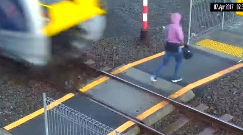 Watch woman escape death by a fraction of second 
