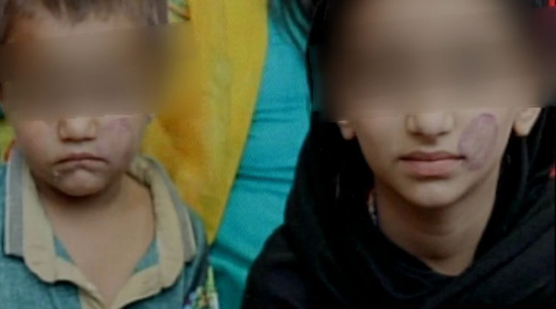 বন্দি বাবাকে দেখতে এসে মুখে স্ট্যাম্প নিয়ে ফিরল দুই খুদে