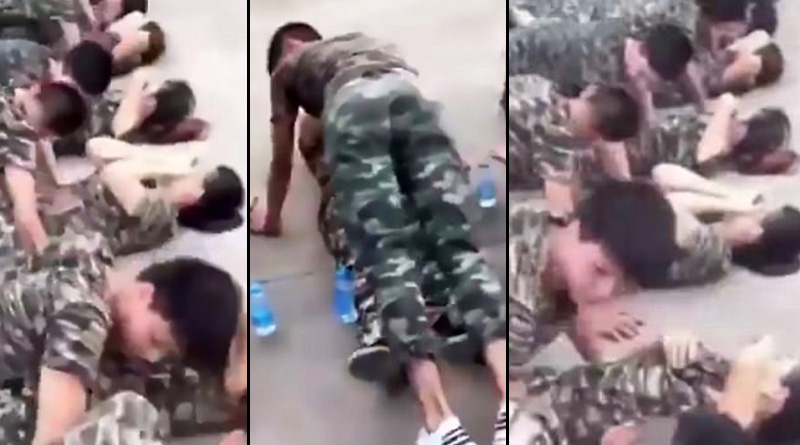 Chinese teenage boys are forced to do press-ups over their girls during military training