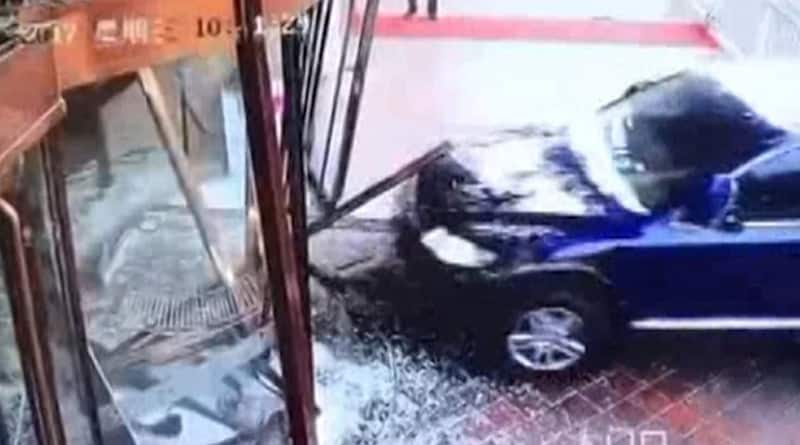 In China: SUV Smashes Through Hotel Door
