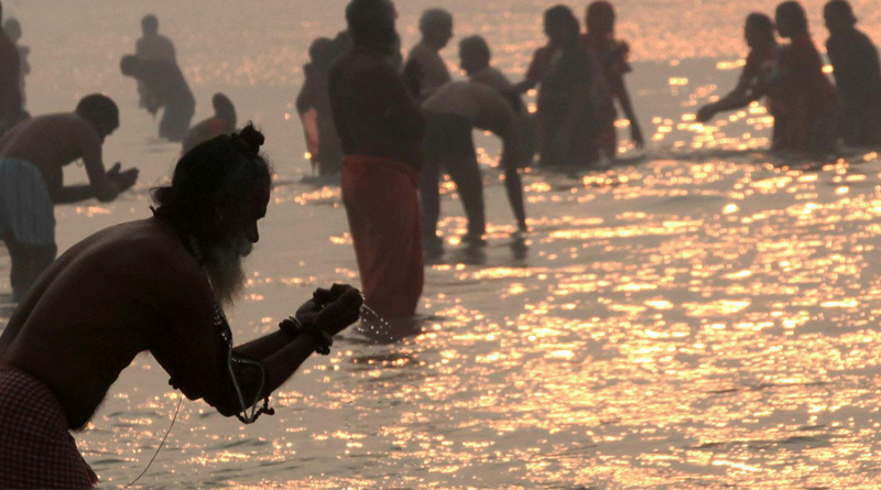 Seeking redemption at sea, people throng Gangasagar