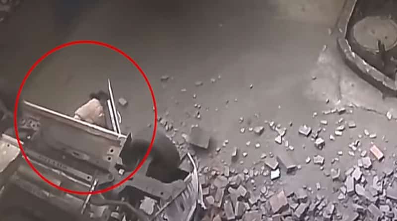 China: Car Smashes through Parking Lot Wall, Drops from Second Floor. Watch