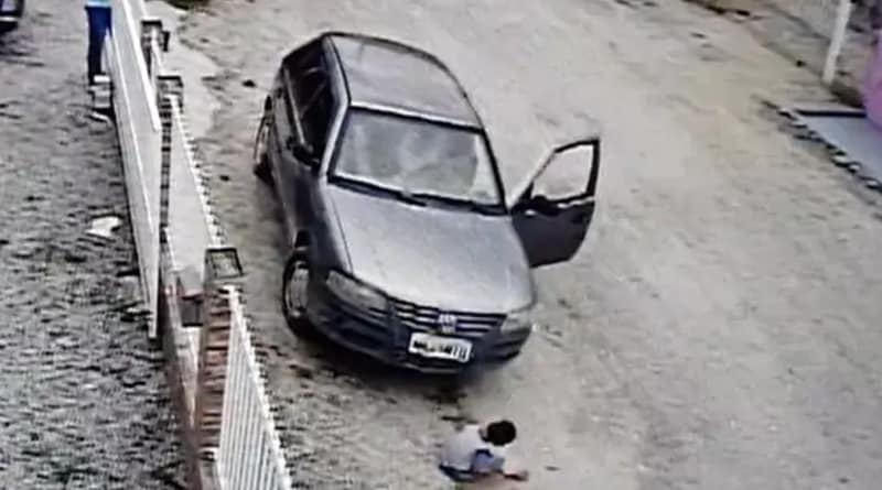 A man accidentally ran over a child has been caught on camera, toddler survived