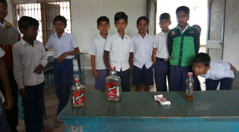 Cops allegedly dump Liquor bottles in Malda school