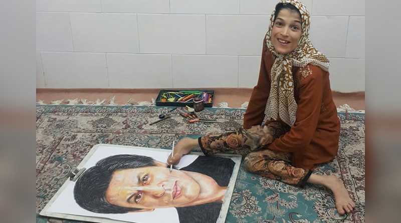 Differently abled Iranian artist wins world with paintings