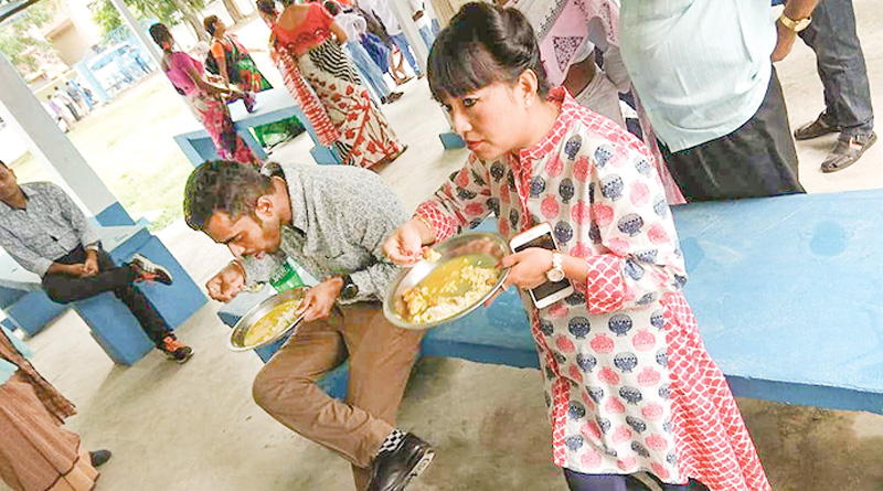 DM eats mid-day meal with students in Alipurduar school