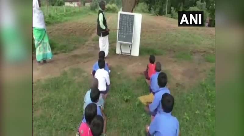 Chhattisgarh: Devoid of building, students forced to study under tree