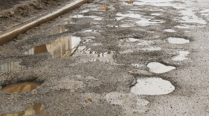 Potholes mark road in Durgapur 