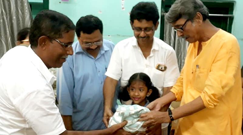 7 year old girl donates handful of money to Kerala relief fund