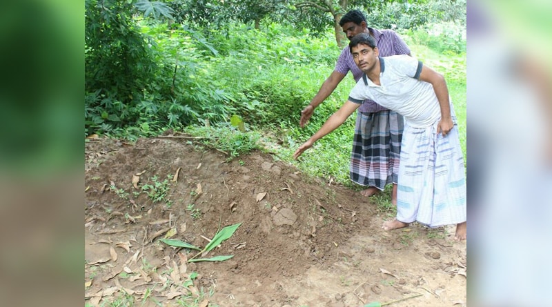Birbhum: Family members tries to exhume the body of child, villagers protest