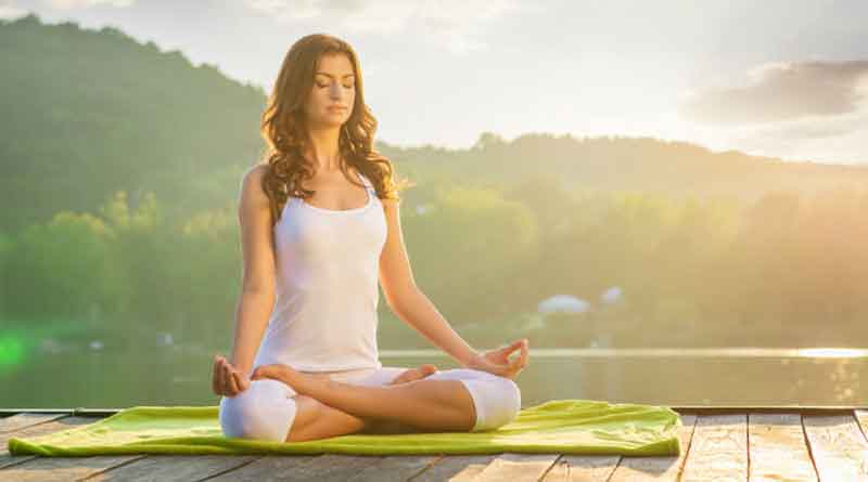 How to reduce stress via Yoga
