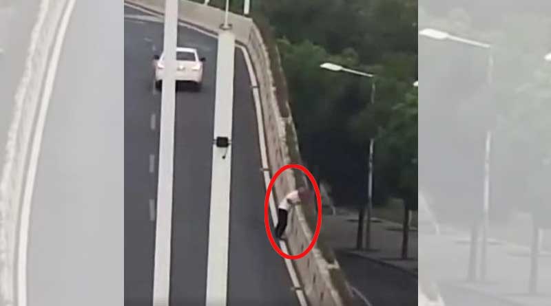 Watch: man jumps off overpass to avoid drink driving test in China 