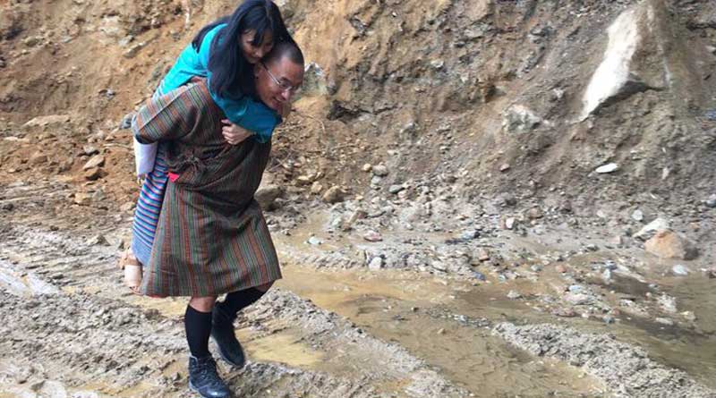 Ex Bhutan PM Carries Wife On Back So Her Feet Don't Get Dirty