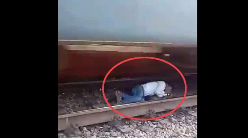 আত্মহত্যার লক্ষ্যে চলন্ত ট্রেনের সামনে ঝাঁপ, তারপর যা হল…