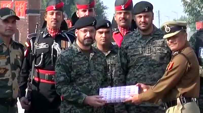 Indian BSF distributes sweets to Pakistan