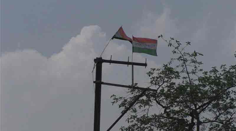 The party flag on the electricity pole at Katwa