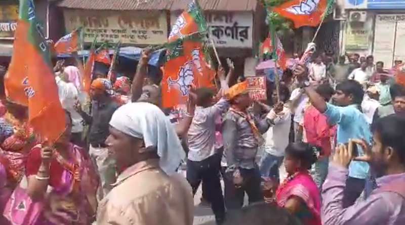BJP supporters dance in front of DM office in Burdwan