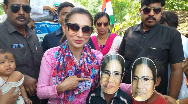 TMC candidate Mimi distributes 'Nakuldana' in an election campaign