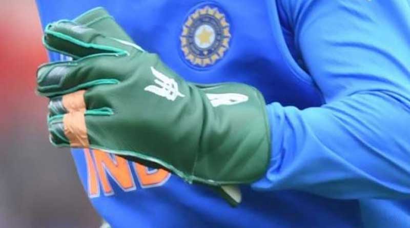 MS Dhoni wears Indian Army Insignia in his gloves.