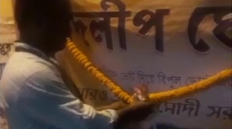 দিলীপ ঘোষের ফ্লেক্সে পুজো! বিতর্কে জড়ালেন তৃণমূল কাউন্সিলরের বাবা
