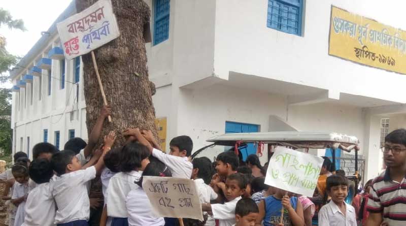 Students of Guskara Primary School protest against tree cutting