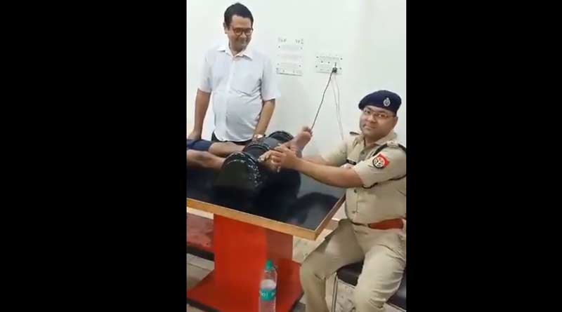 কাঁওর পুণ্যার্থীর পা টিপে দিচ্ছেন পুলিশ সুপার! ভাইরাল ভিডিও ঘিরে বিতর্ক