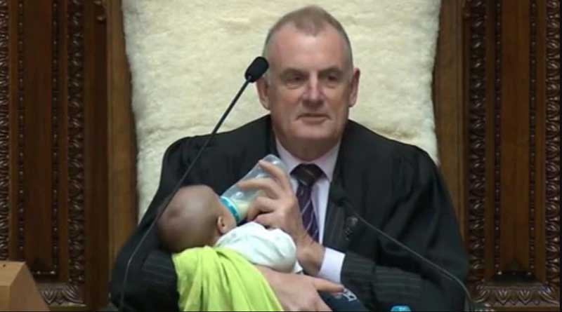 New Zealand Speaker cradles and feeds MP's baby in Parliament