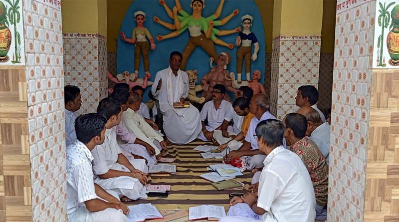The priests are taking classes for Durga Puja at Asansol