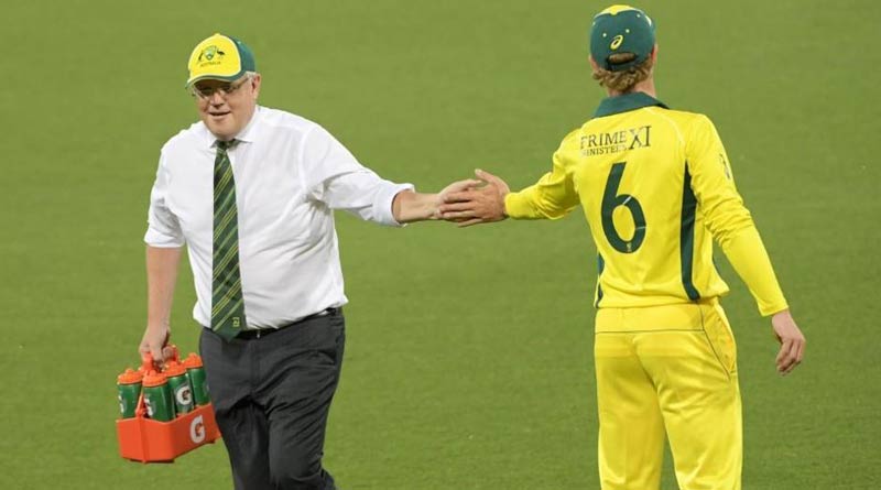 Australia PM Scott Morrison turns water boy during match
