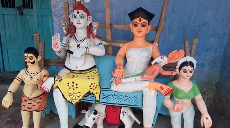 Durga with Ganesha on her lap, Kashipur family worships Devi as eternal mother