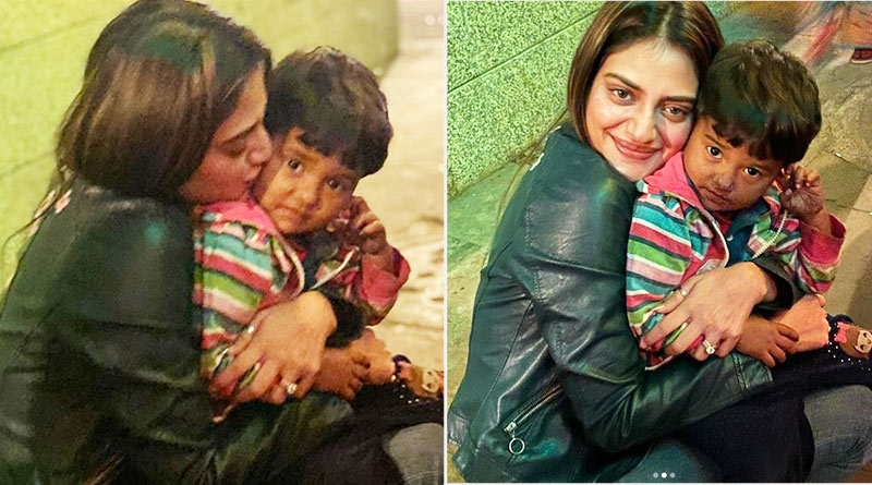 বেলুন বিক্রি করছে পথশিশু, কোলে বসিয়ে ছবি তুললেন সাংসদ নুসরত