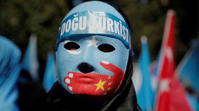 Face masks made with forced Uighur labour in China sold in Australia