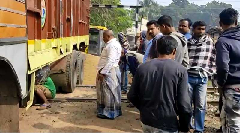 A truck stucked on rail track in Bongaon, train service disrrupted