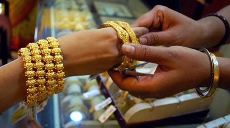 Gold prices sharp rise after the Reserve Bank of India hiked interest rates । Sangbad Pratidin