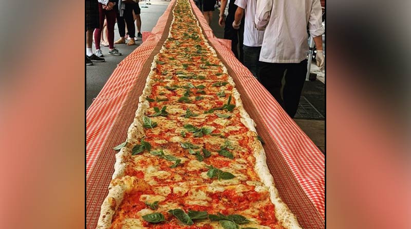 Australian restaurant cooks 338-foot pizza to raise funds for firefighters