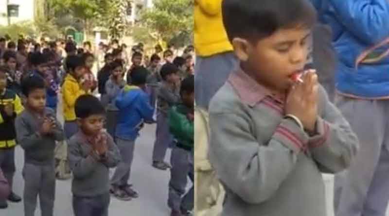 Little boy sucks candy while prayer at the school, video goes viral