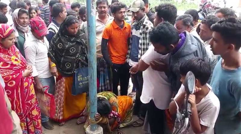 দোকান থেকে শাড়ি চুরির অভিযোগ, ল্যাম্পপোস্টে বেঁধে মহিলাকে বেধড়ক মার